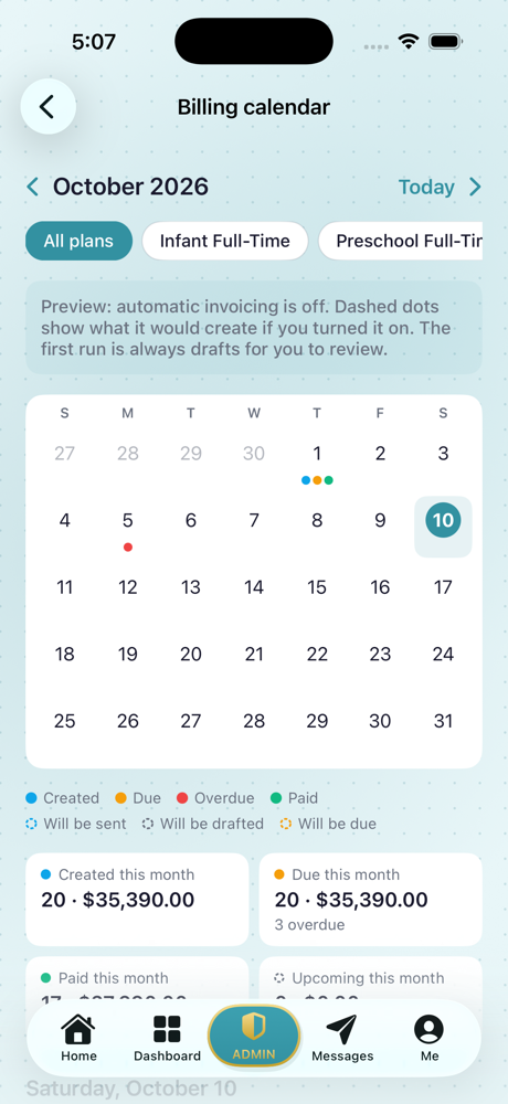 The billing calendar in the iPhone app: a month grid with colored dots under each day, plan filters, and month totals